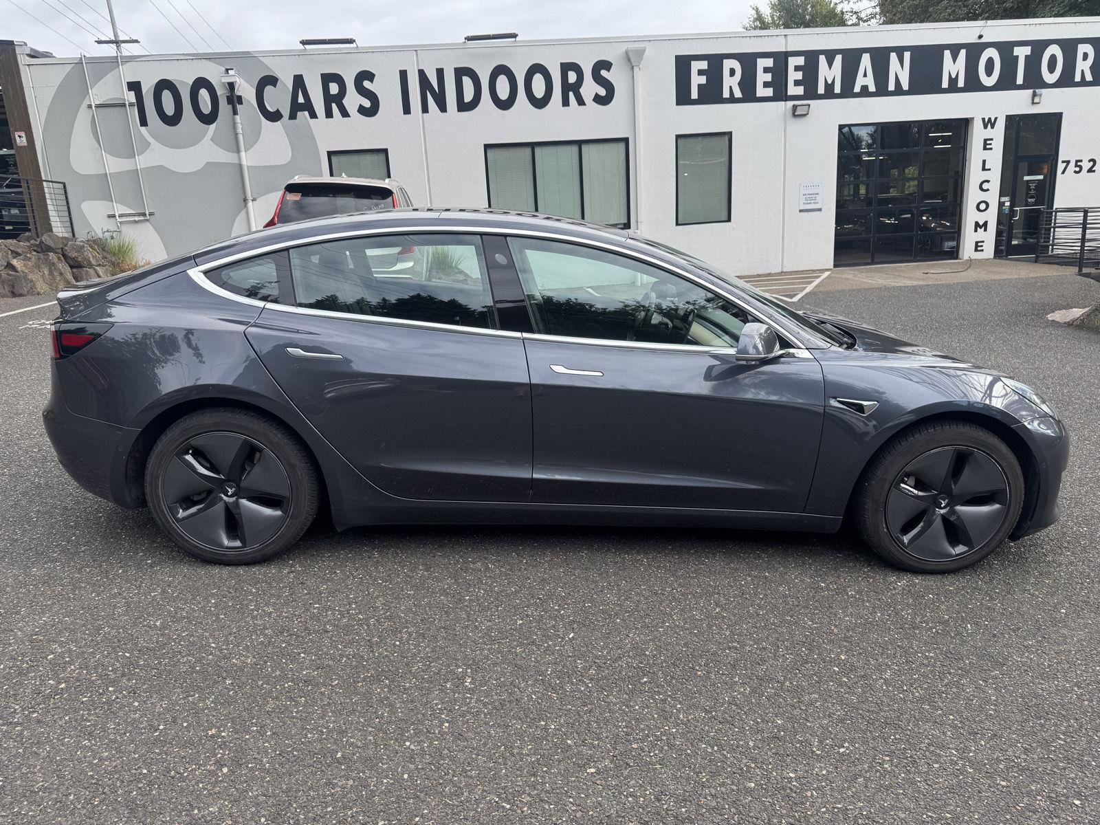 tesla model 3 2018 5YJ3E1EB9JF113799 image tesla model 3 2018 5YJ3E1EB9JF113799 image